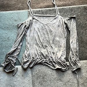 Off shoulder cropped blouse.